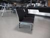 (20) Three person seat, cast alloy construction. Black leather style seat and backs, chromed feet. L 1600mm D 600mm H 800mm - 3