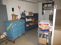 (LOT) ASST'D LADDERS, SCREWS WITH CABINET, WHEEL, RACKS, LIGHT BULBS, ELECTRICAL AND TOOL CART WITH VISE