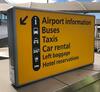 Illuminated sign, showing airport information etc.