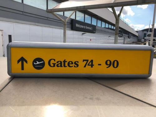 Illuminated sign, showing Gates 74-90