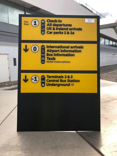 Wall mounted acrylic information board, showing Terminal 1 floor levels