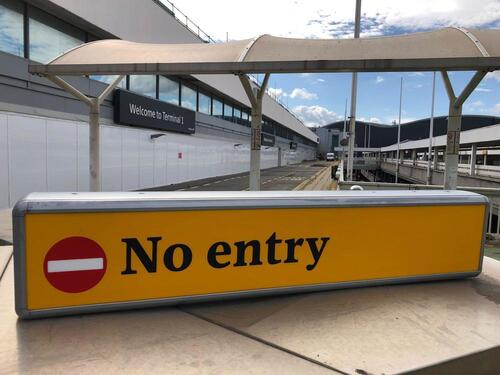 Illuminated sign, showing No entry & No smoking