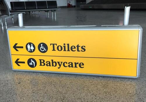 Illuminated 'Toilets & Babycare' Direction Sign