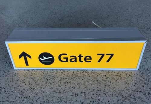 Illuminated Terminal 'Gate 77' Direction Sign