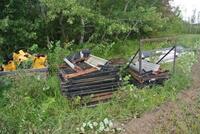 LOT OF METTAL GRATES, YELLOW METAL COMPONENTS AND ROLLS OF TARP