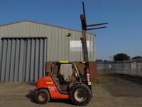 Manitou MH 25-4 T Buggie EvolutionSeries2-E2 2500kg @ 500mm Load Centres Diesel Engine Rough Terrain Fork Lift Truck, max lift height 3700mm, with triple mast,1070mm long forks, pneumatic tyres and lights, (No Doors On Cab). CE MARK EVIDENT. Year: 2005