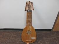 ARNOLD DOLMETSCH HASLEMERE LUTE, NO. 690, (LOCATION: SHOEN LIBRARY 2ND FLOOR)