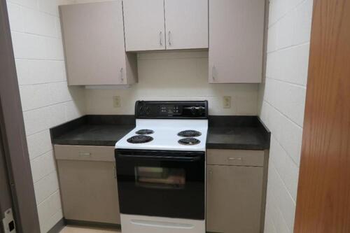 KITCHEN, TAPPAN ELECTRIC RANGE WITH DIGITAL CONTROLS, KITCHEN CABINETS., Aquinas Hall, 1ST FLOOR, RMKITCHEN1