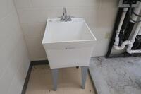 LAUNDRY, 1-WASH SINK, 2-STACK CHAIRS, 1-WET FLOOR SIGN., Aquinas Hall, 1ST FLOOR, RMLAUNDRY1