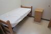 DORM SUITE, 4-TWIN SIZE BUNKABLE BEDS, 4-2 DOOR WARDROBES, 4-3 DRAWER DRESSERS, 4-DESKS, 4-CHAIRS, 1-SOFA, 2-ARM CHAIRS, KITCHEN WALL CABINET, KITCHEN COUNTER WITH SINK. , Aquinas Hall, 2ND FLOOR, RM206 - 7