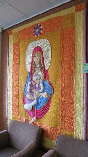 PAINTED AND APPLIQUED QUILT "PAINTED MADONNA" BY PENNY SISTO, FLOYD KNOBS, HUNDLEY, 1ST FLOOR, RM MATTINGLY READING ROOM