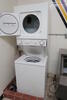 GE STACKABLE ELECTRIC WASHER/DRYER COMBO. , LOURDES HALL, LL FLOOR, RM GIRLS LOCKER ROOM