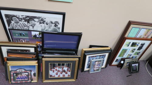 LOT, MISC SCC GOLF PHOTOS IN FRAMES AND BINDERS, 1-TALL WOODEN BOOKCASE, LOURDES, LL FLOOR, RM L08