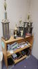 LOT, WOODEN BOOKSHELF PLUS CONTENTS MISC GOLF TROPHIES AND PLAQUES, LOURDES, LL FLOOR, RM L08