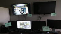 LOT, SECURITY COMPUTER SYSTEM,3-TOWERS, 4-DESKTOP MONITORS, 2-LCD LARGE WALL MONITORS, LOURDES, LOWER FLOOR, RM SECURITY OFFICE