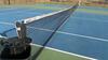 LOT, 3 TENNIS NETS AND POLES, ALL BALLBINS AND RAQUET HOLDERS, ROLLER MOPS, BROOMS, 1 PICNIC TABLE, LOWER TENNIS COURT, FLOOR, RM - 5