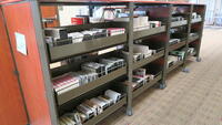 LOT, BOOKS AND VIDEOS PLUS SHELVES, JUVENIAL BOOKS, MISC DVD AND VHS, HUNDLEY, 1ST FLOOR, RM EAST