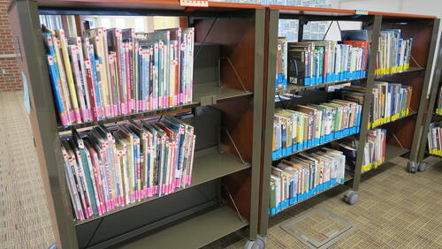 LOT, BOOKS AND VIDEOS PLUS SHELVES, JUVENIAL BOOKS, MISC DVD AND VHS, HUNDLEY, 1ST FLOOR, RM EAST