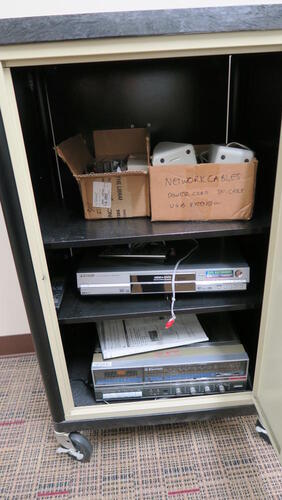 LOT, A/V CABINET PLUS CONTENTS, EMERSON STEREO, PANASONIC DVR, HUNDLEY, 1ST FLOOR, RM LIBRARY OFFICE HALLWAY