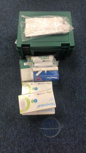 Various first aid kits and COVID tests