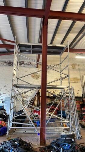 Assembled YOUNGMANS Aluminium Tower Scaffold comprising 2 Ladder Uprights, 2 Uprights, 19 Cross Beams and Steadies and 4 Walk Boards