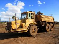 1998 CATERPILLAR D250E ARTICULATED WATER TRUCK, 5,000 GALLON, 6847 HRS., VIN/SERIAL:5TN1613, (HC&S No. 3352)