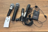 LOT OF ASSORTED MICROPHONES INCL. (1) SHURE PG48, (1) SHURE SM58, (1) SHURE 545SD, (1) RADIOSHACK 33-3039, AND (2) LAVALIERS WITH (1) PHENYX UHF BODYPACK TRANSMITTER