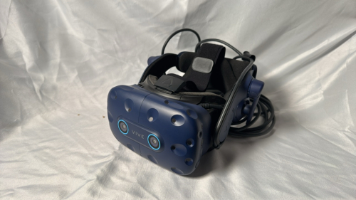 HTC VIVE PRO HEADSET KIT WITH CONTROLLERS, BASE STATIONS AND HDMI CABLE ADAPTER.