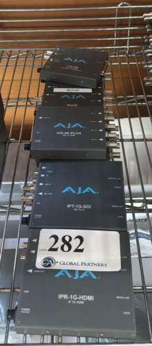 LOT OF ASSORTED AJA CONVERTERS INCLUDING (1) IPR-1G-HDMI, (1) IPT-1G-SDI, HI5-4K-PLUS, (1) 4K2HD, (1) ROI-DVI, AND (1) 12G-AM AUDIO EMBEDDER/DISEMBEDDER,