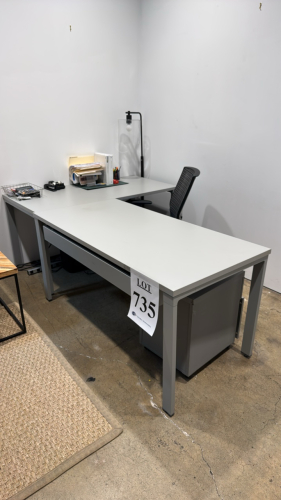 Office table with office chair and mini book shelf