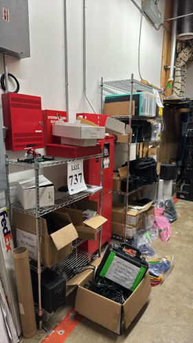 Assorted office and video supplies with rack
