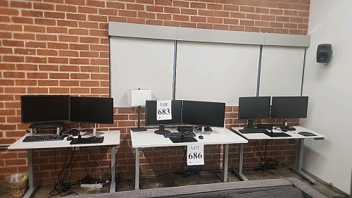LOT OF (3) 48"x24" UPLIFTDESK STANDING ADJUSTABLE STANDING DESKS. DELAYED PICKUP. DESKS ONLY, CONTENTS NOT INCLUDED