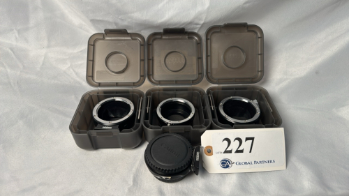 LOT OF (1) METABONES EF-M43 MOUNT S SPEED BOOSTER, (2) METABONES EF-MOUNT T ADAPTERS, (1) FOTASY EOS-M4/3 ADAPTER, AND 3 CASES