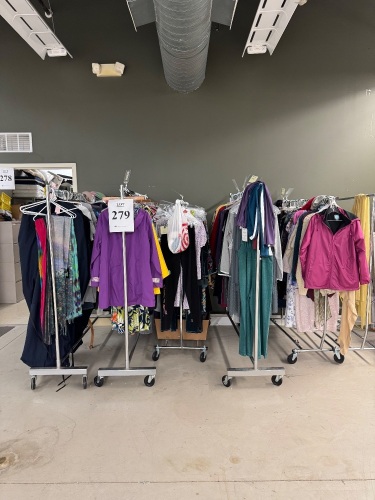 (6) ROLLING GARMET RACKS FULL OF ASSORTED CLOTHING