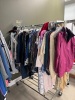 (6) ROLLING GARMET RACKS FULL OF ASSORTED CLOTHING - 6