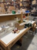 (LOT) ASSORTED SPARE PARTS, BELTS, ELECTRICAL WIRE, WHEELS, BREAKERS, SENSORS, MOTORS, LADDER, RACKS, WORK BENCH, CABINET AND DESK - 6