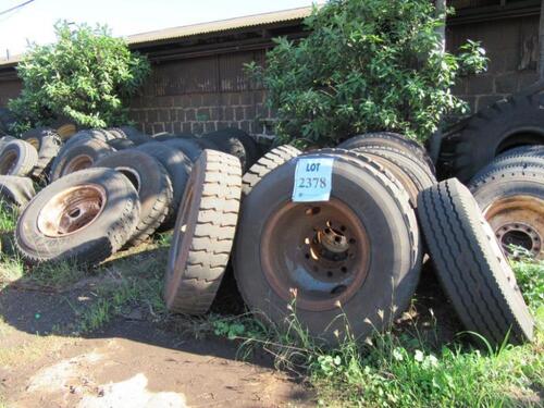 LOT OVER (100) NEW AND USED TIRES, 18.4-38, 525R1257, 19.5L-24, 425/65R22.5, 17.5L-24, 24.5-32, 12.00R24,650/75R32, (FIELD EQUIPMENT YARD)