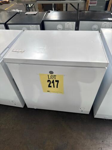 GE 7.0 Cu. Ft. Chest Freezer, Model FCM7STBWW, featuring manual defrost, garage ready (0&deg;F to 110&deg;F), 2 plastic lift-out sliding baskets, exterior power 'On' light, adjustable temperature control, upfront defrost drain, energy consumption of 250 kWh/year.
