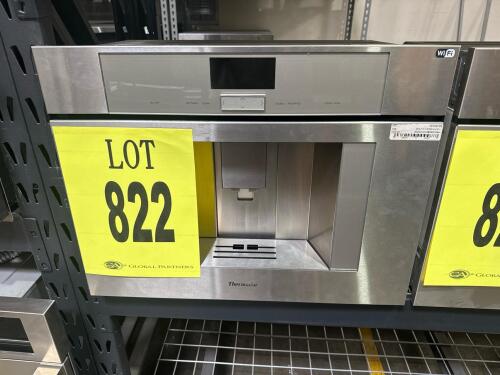 Thermador TCM24TS/01 Built-in Fully Automatic Coffee Machine, featuring a Ceramic Disk Grinding System, Integrated Milk System with Hose, Full-color TFT Display, and the ability to store up to 8 personalized beverages. Serial Number: 718090200360002844.