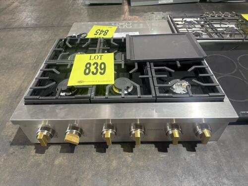 Monogram ZGU366NTSS 36" Gas Cooktop featuring 6 burners, including two 23,000-BTU multi-ring brass burners, two 18,000-BTU burners, and two 15,000-BTU burners; stainless steel construction with brass accents; electronic ignition with automatic re-ignition