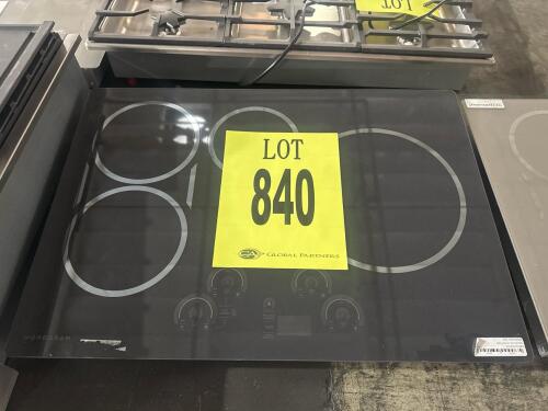 Monogram ZHU30RDPBB is a premium 30-inch induction cooktop featuring glide touch controls, four induction cooking elements including an 11" 3,700W element, SyncBurners, melt setting, pan presence and size sensors, control lock capability, and a modern whi