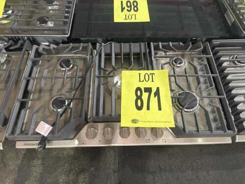 36-inch stainless steel Frigidaire FCCG3627AS gas cooktop with 5 burners, electronic ignition, cast iron grates, and compatibility with natural gas (and convertible to propane). serial number 1F23991276.