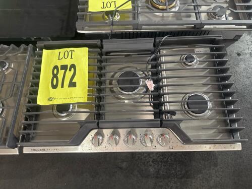 Frigidaire Gallery GCCG3648AS 36-inch gas cooktop featuring 5 burners, electronic ignition, stainless steel surface, front control knobs, and ADA, CSA, UL certifications. S/N-000903