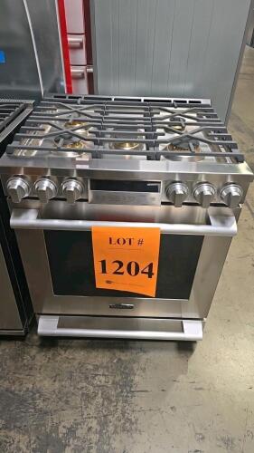 Signature Kitchen Suite 30" Gas Slide-in Range, Model UPSG3014ST, featuring 6.3 cu. ft. capacity, ProHeat&trade; Convection, 5 sealed burners, RapidHeat&trade; Burners up to 18,500 BTUs, self-cleaning with Speed Clean. Serial Number: 106KMQG0X548.