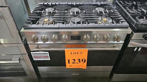 Smeg SPR36UGGX is a 36-inch full gas range featuring 6 sealed burners, a 4.45 cubic foot oven, stainless steel with satin finish, a soft close door system, EverClean enamel cavity. Serial Number: 2 731065 20214 0013 01 14. RETAIL: $4999