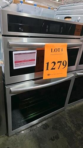 A used Frigidaire GCWM3067AFB built-in electric wall oven and microwave combination unit, featuring convection, air fry, steam, touch controls, and stainless steel finish. S/N-VF22721748 $4199