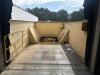 Industrial Stationary Trash Compactor, Approx. 64" x 60" Chamber ((DELAY PICKUP MID-OCTOBER) Bolted to the ground and welded to loading dock), (BUYER NEEDS TO CUT BOLTS and un- welded)