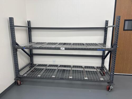Heavy-duty metal shelving rack with wire mesh shelves and mobile locking casters, approx. dimensions 102" L x 36" D x 72" H, LOCATION: IN ROOM WITH MTEX PRINTER)