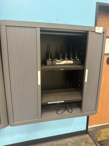Lot (11) RCA RDR2500 PKG TWO-WAY RADIO AND (3) 6 STATION CHARGERS, (OLDER UNITS WITH BATTERIES) PLUS WALL MOUNTED ROLLING SHUTTER CABINET, 43&rdquo; L x 16&rdquo; D x 41&rdquo; H
