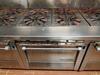 GARLAND 4-BURNER RANGLE / OVEN W/ STAINLESS STEEL SHELVING - (LOCATION: 2ND FLOOR KITCHEN)